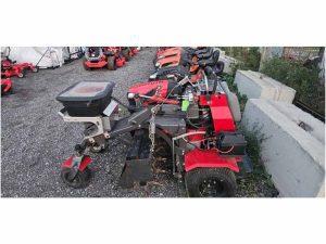 Used Z-plug stand on Aerator with Spreader